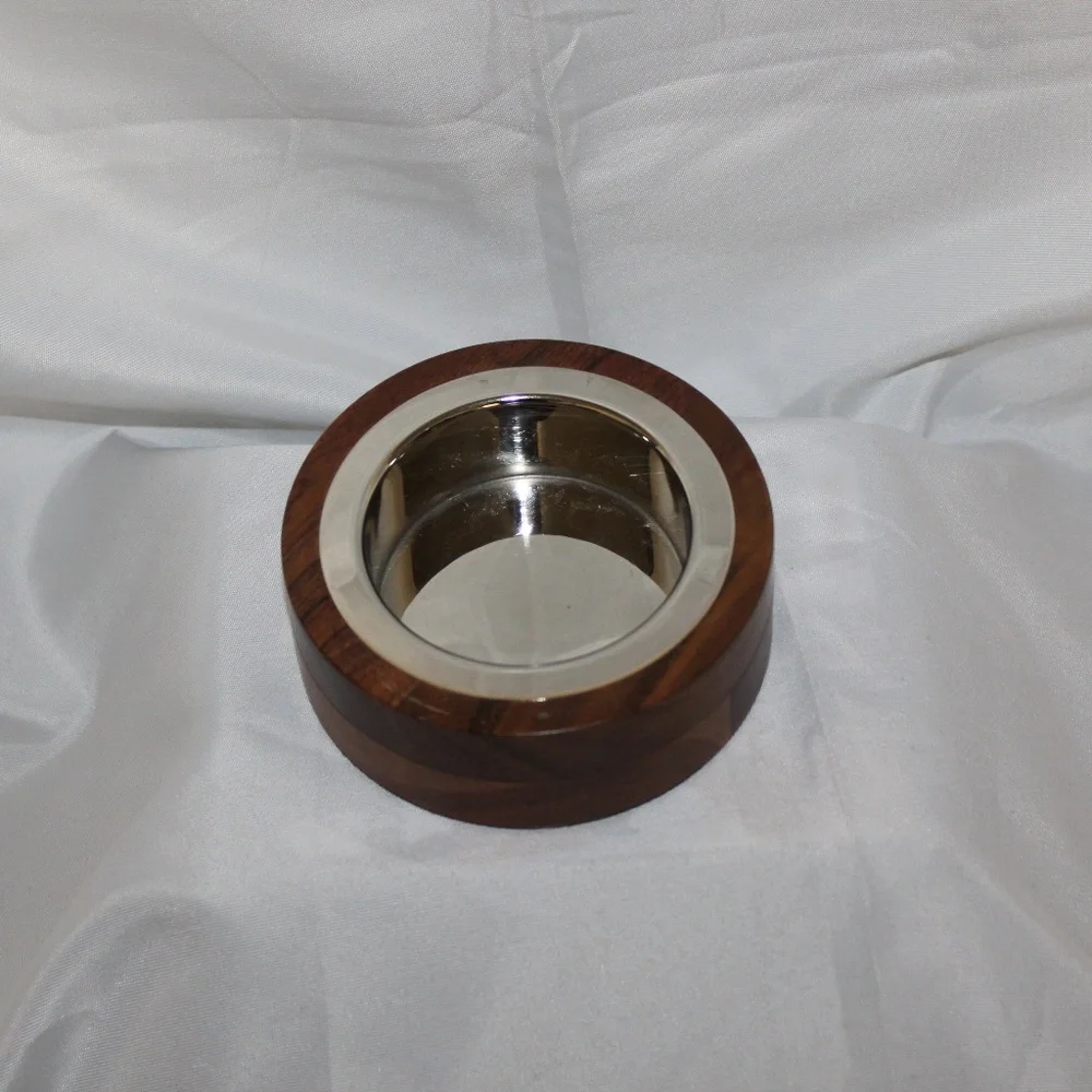 West Elm solid acacia wood bowl with metal alloy bowl in a Silver finish.